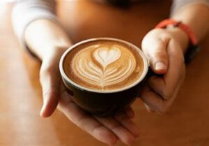 latte being enjoyed in a coffee shop